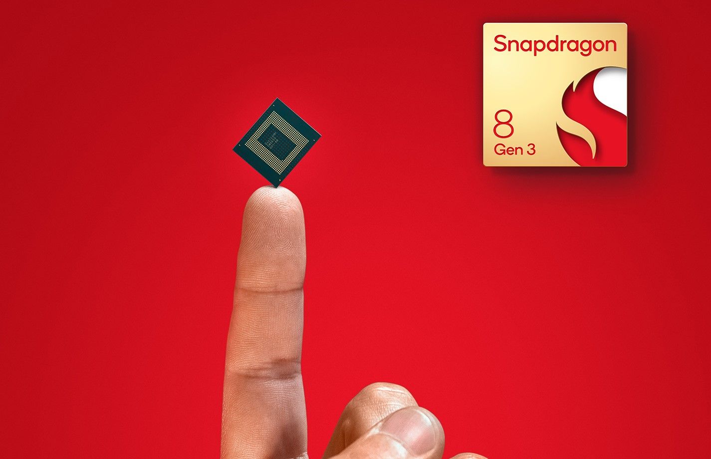 Um SoC móvel repousa no dedo de uma pessoa.  O logotipo do Qualcomm Snapdragon 8 Gen 3 está em segundo plano.