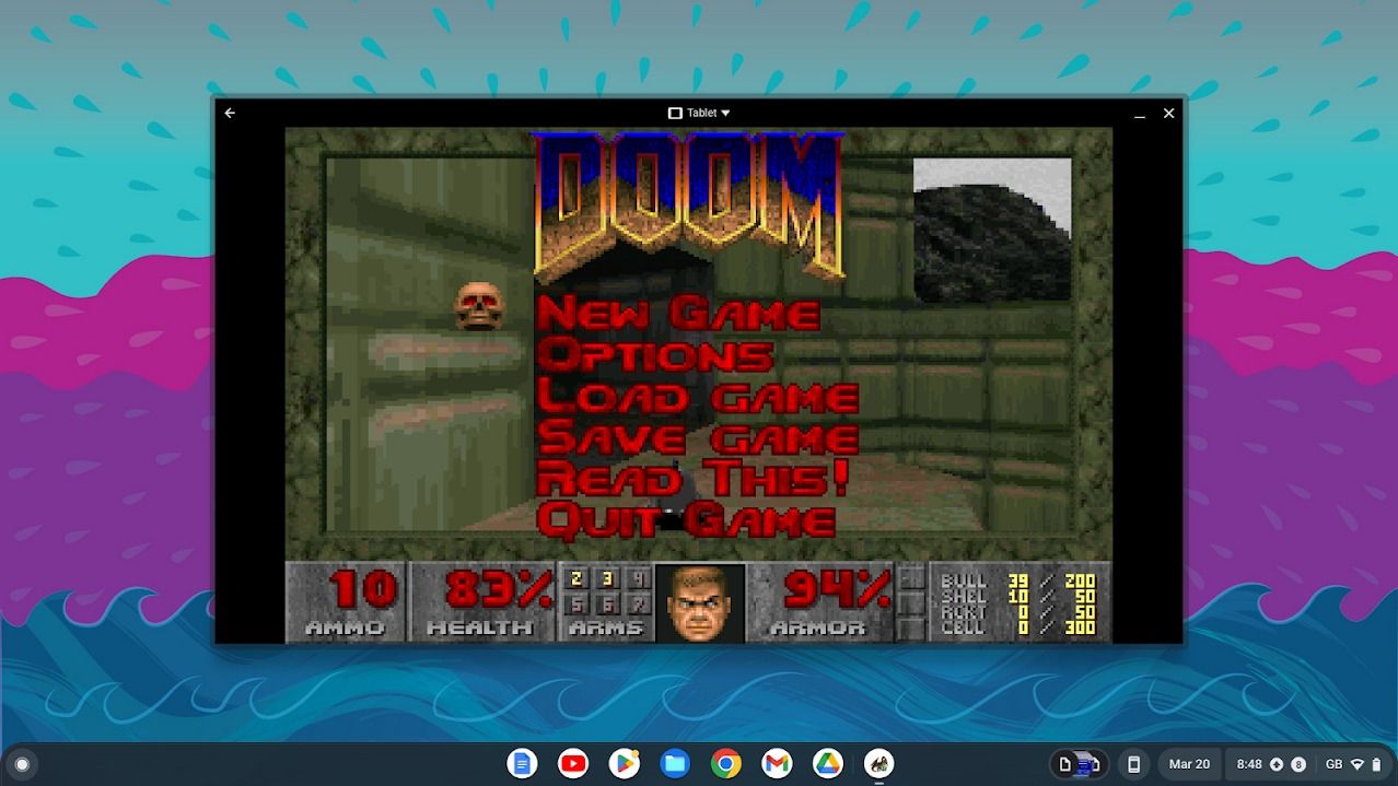 jogo doom rodando na janela do emulador DOS no Chromebook com fundo azul rosa e azul escuro