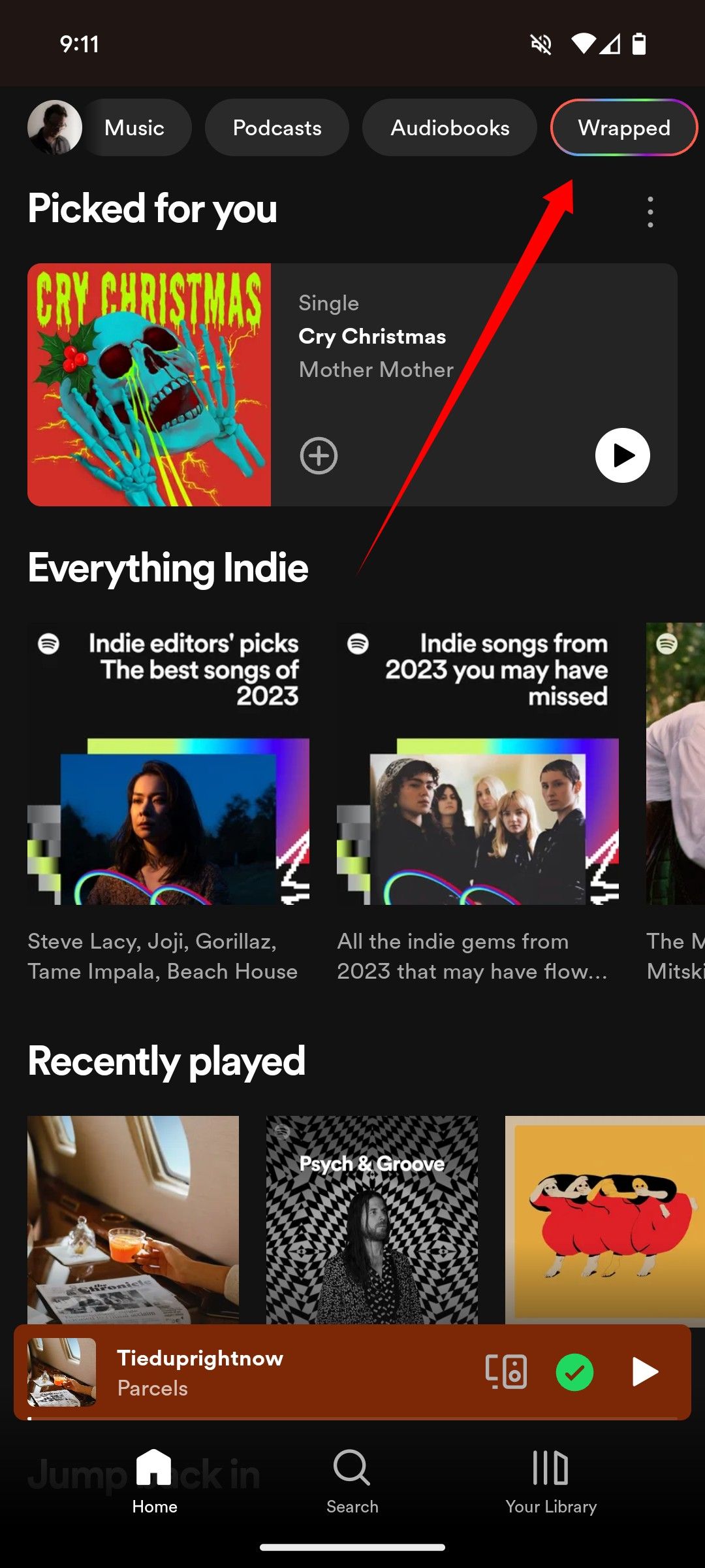 Uma seta apontando para o local específico da opção Wrapped no aplicativo Spotify