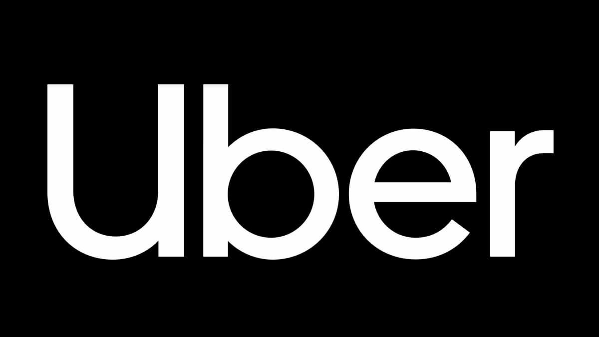 O logotipo da Uber contra um fundo preto