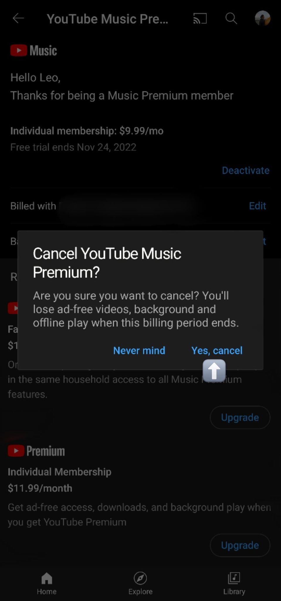 O pop-up de cancelamento final que pergunta 'Cancelar YouTube Music Premium?'  com uma seta branca em uma caixa cinza apontando para Sim, cancelar no canto inferior direito do pop-up no aplicativo YouTube Music para Android