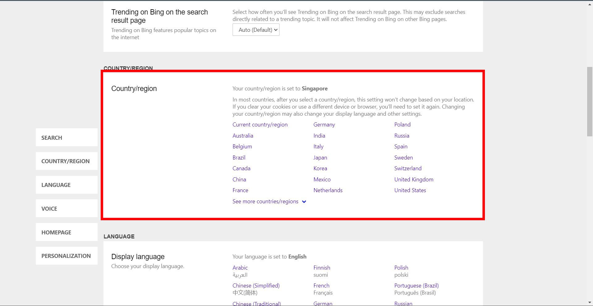 Uma captura de tela da página de configurações do Bing mostrando a seção País/Região com vários países listados e Cingapura selecionada.