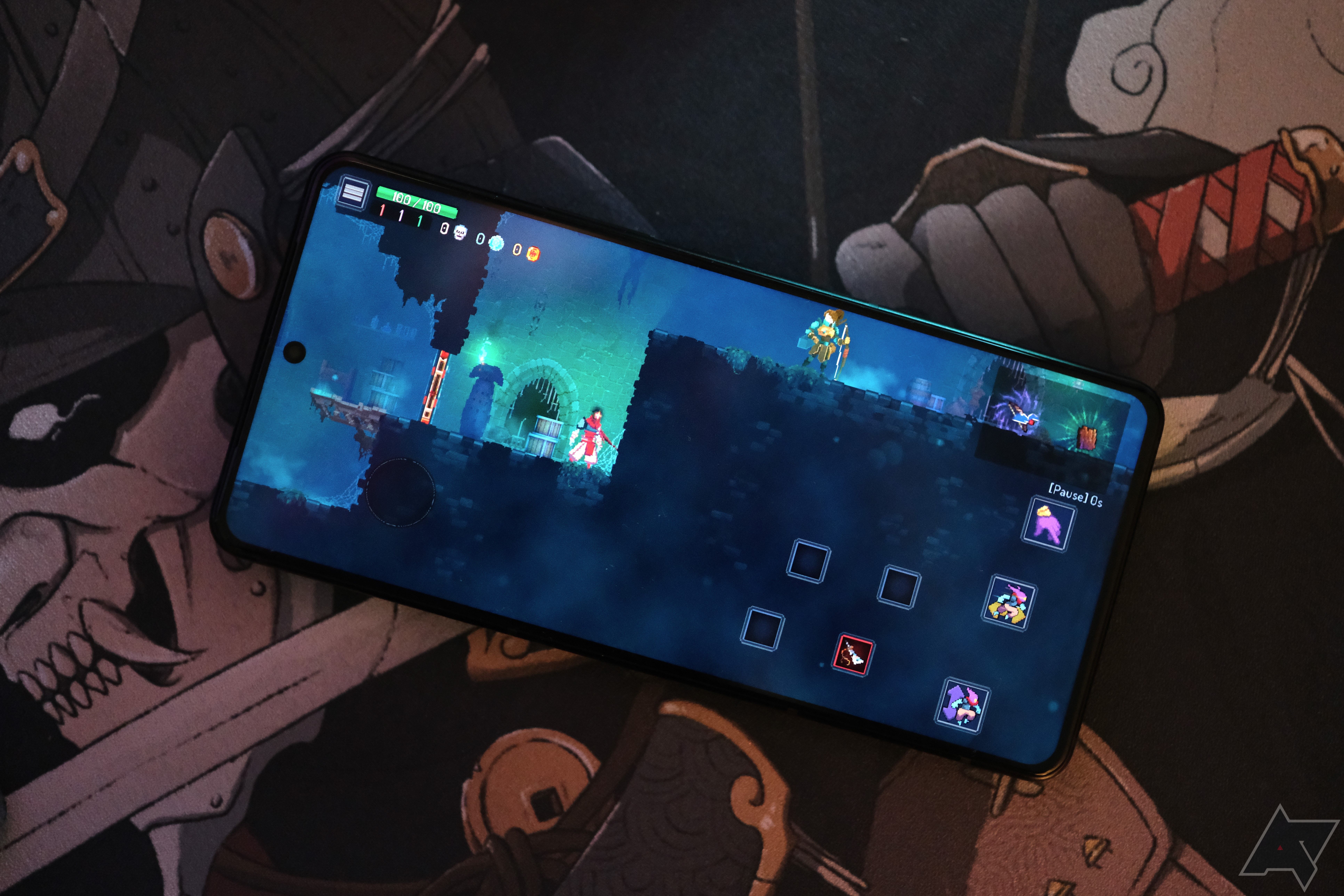 ROG Phone 8 Pro deitado no tapete mostrando o jogo em tela cheia
