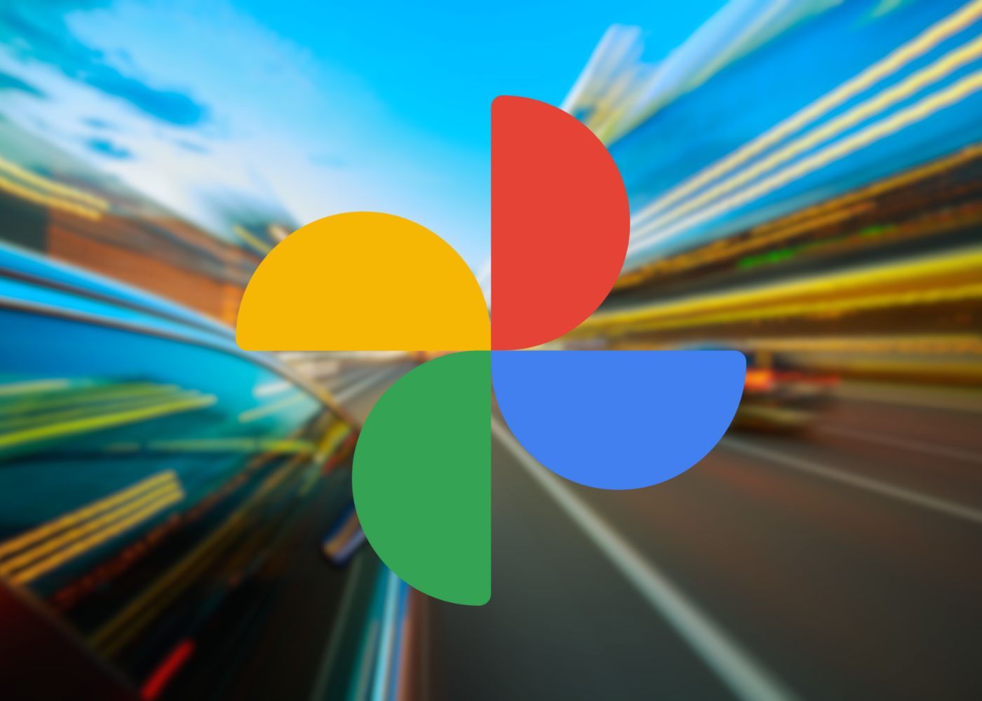 Logotipo da foto do Google sobreposto a uma imagem de trânsito desfocado