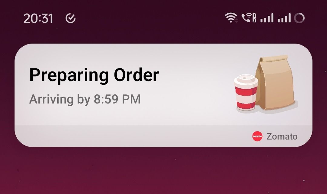 Status ao vivo da entrega de comida Zomato em um elemento como a Ilha Dinâmica no OnePlus Open rodando Android 14