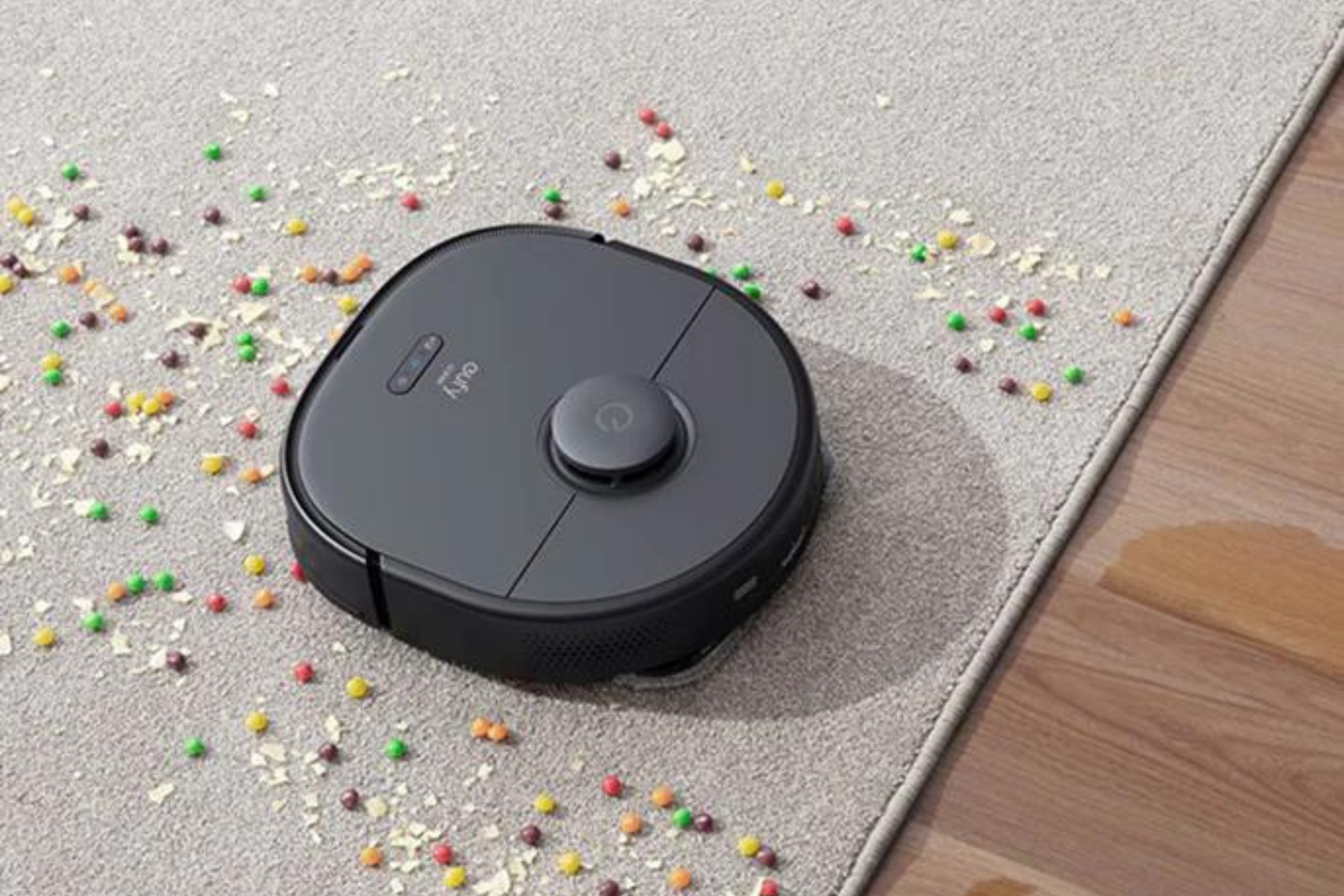 Eufy X9 Pro Robot aspirador e esfregão com estação de limpeza automática no carpete comendo doces