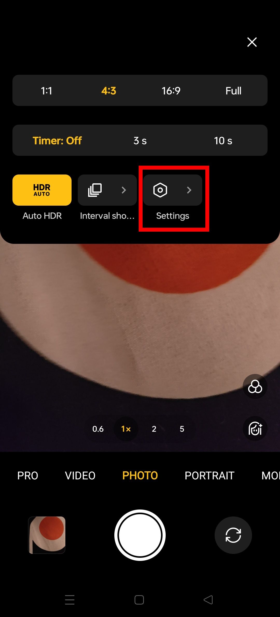contorno de retângulo vermelho sobre as configurações no aplicativo de câmera oneplus