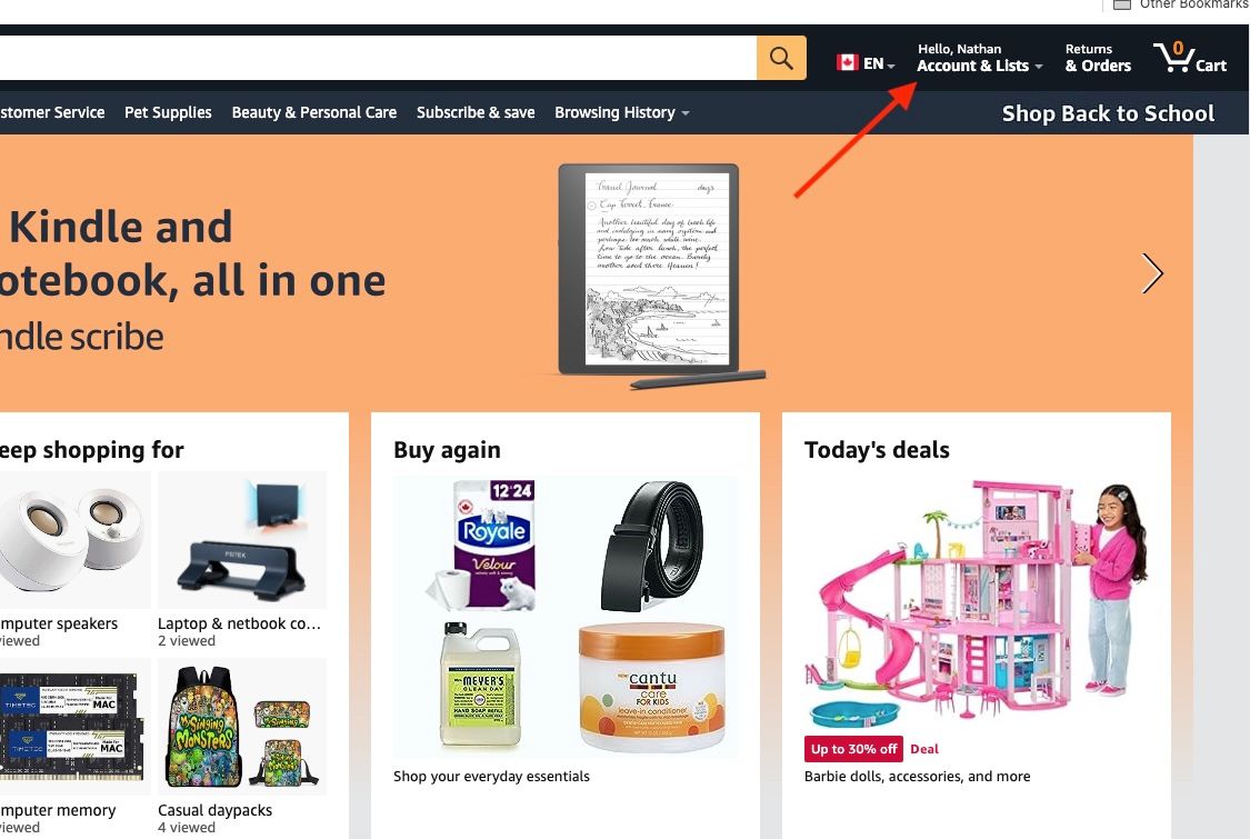 A página inicial da Amazon com uma seta vermelha apontando para a opção Contas e listas 