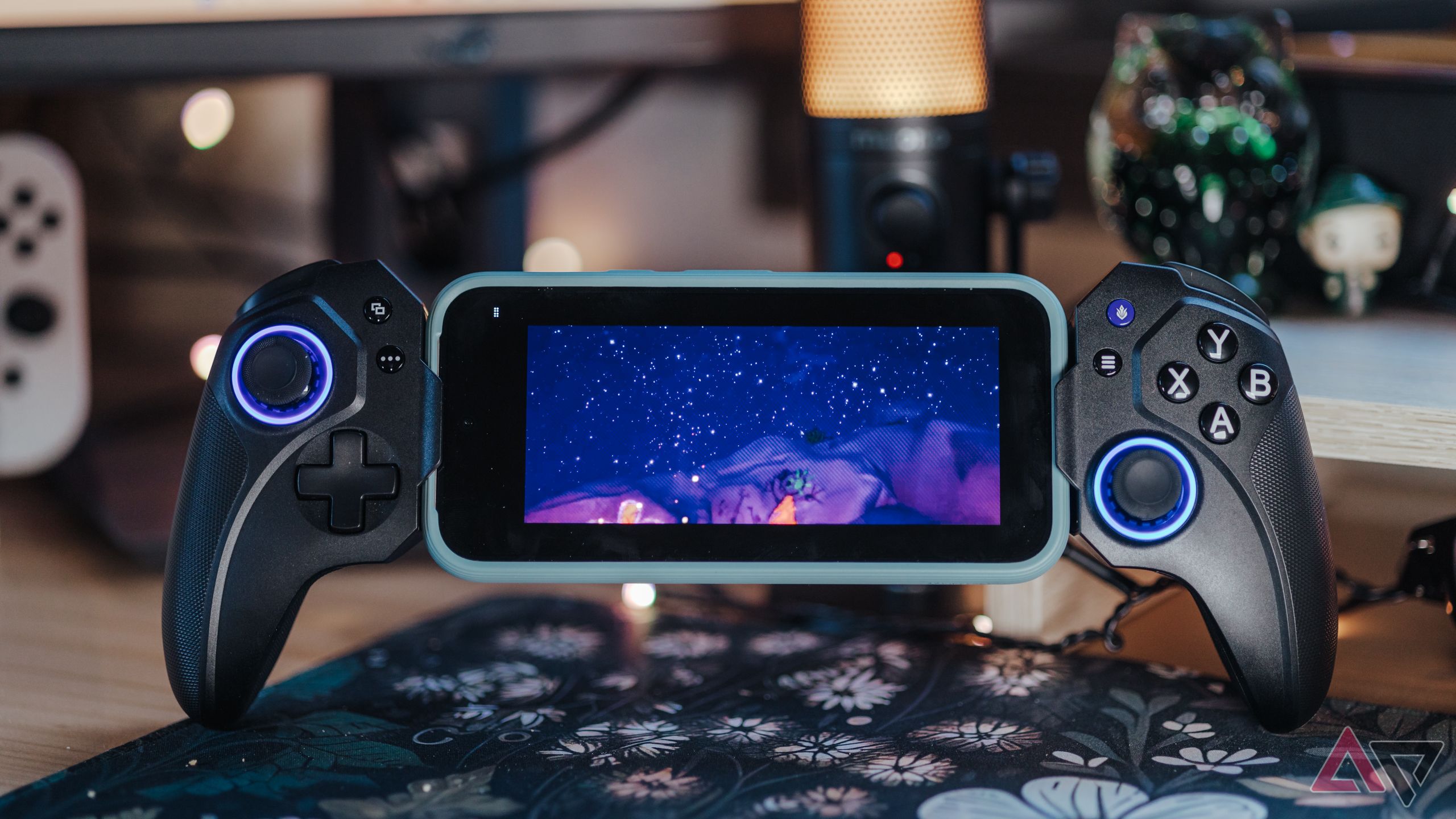 Controlador de jogos para dispositivos móveis ELO Vagabond exibindo o Google Pixel 9 "Tchia" o jogo