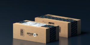 Two Amazon shipping boxes against a dark background