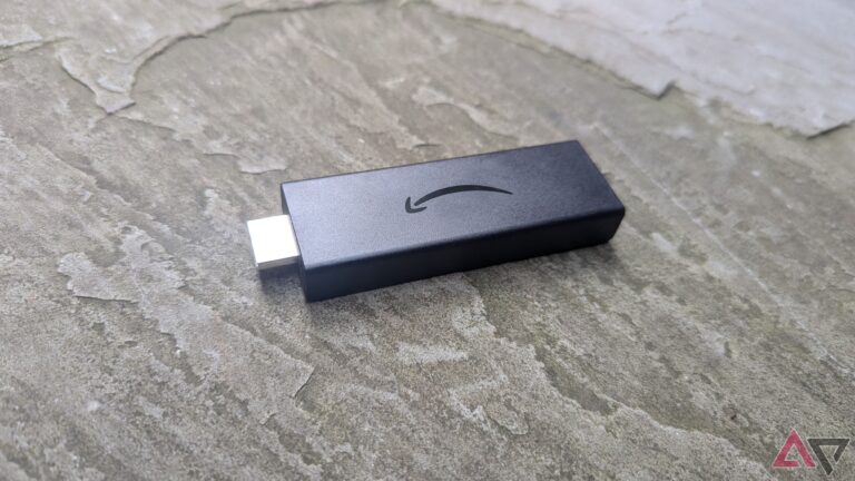 Amazon Fire TV Stick Lite on gray pavement